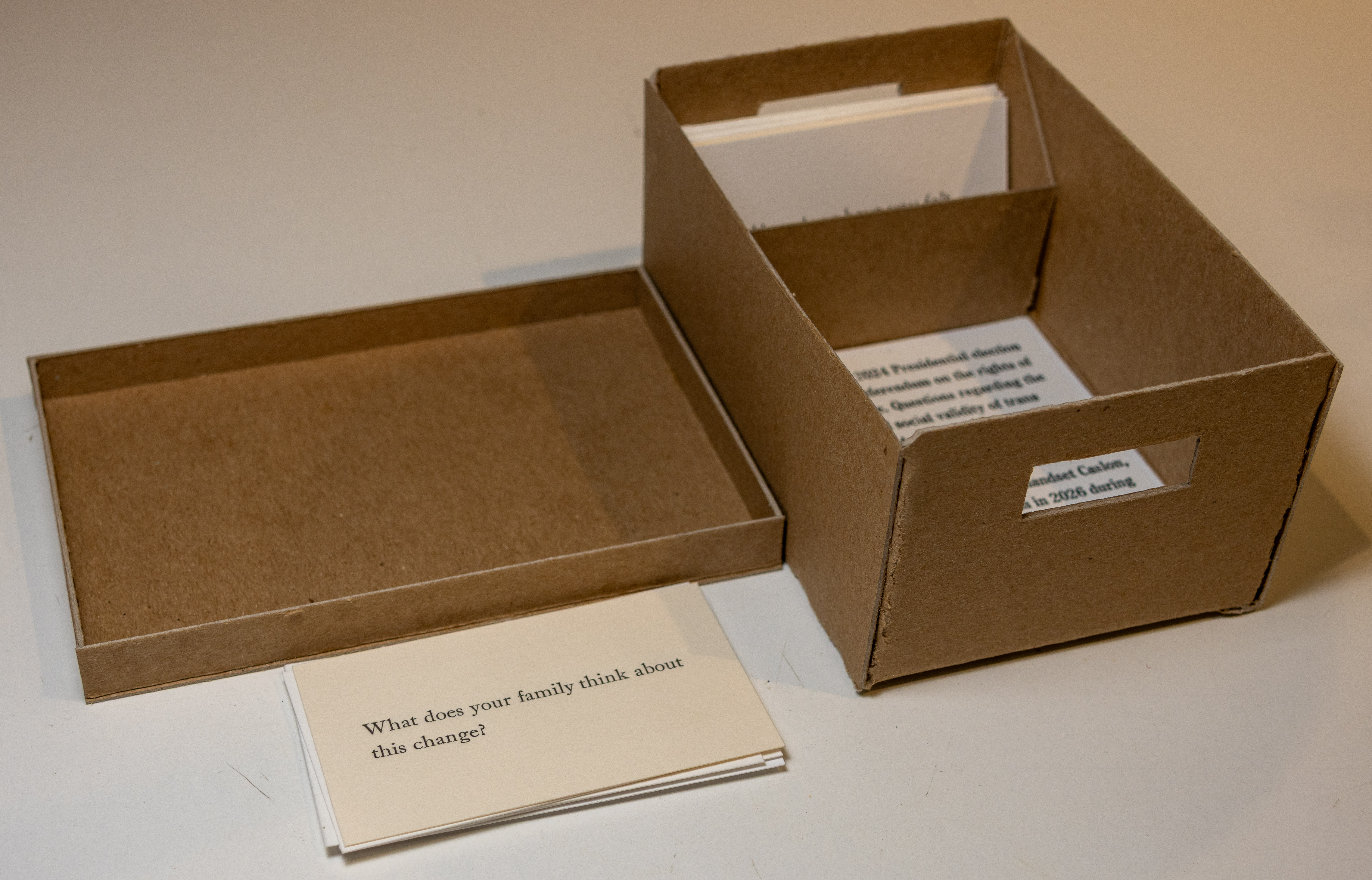 An image of a chipboard box with a just-visible colophon.