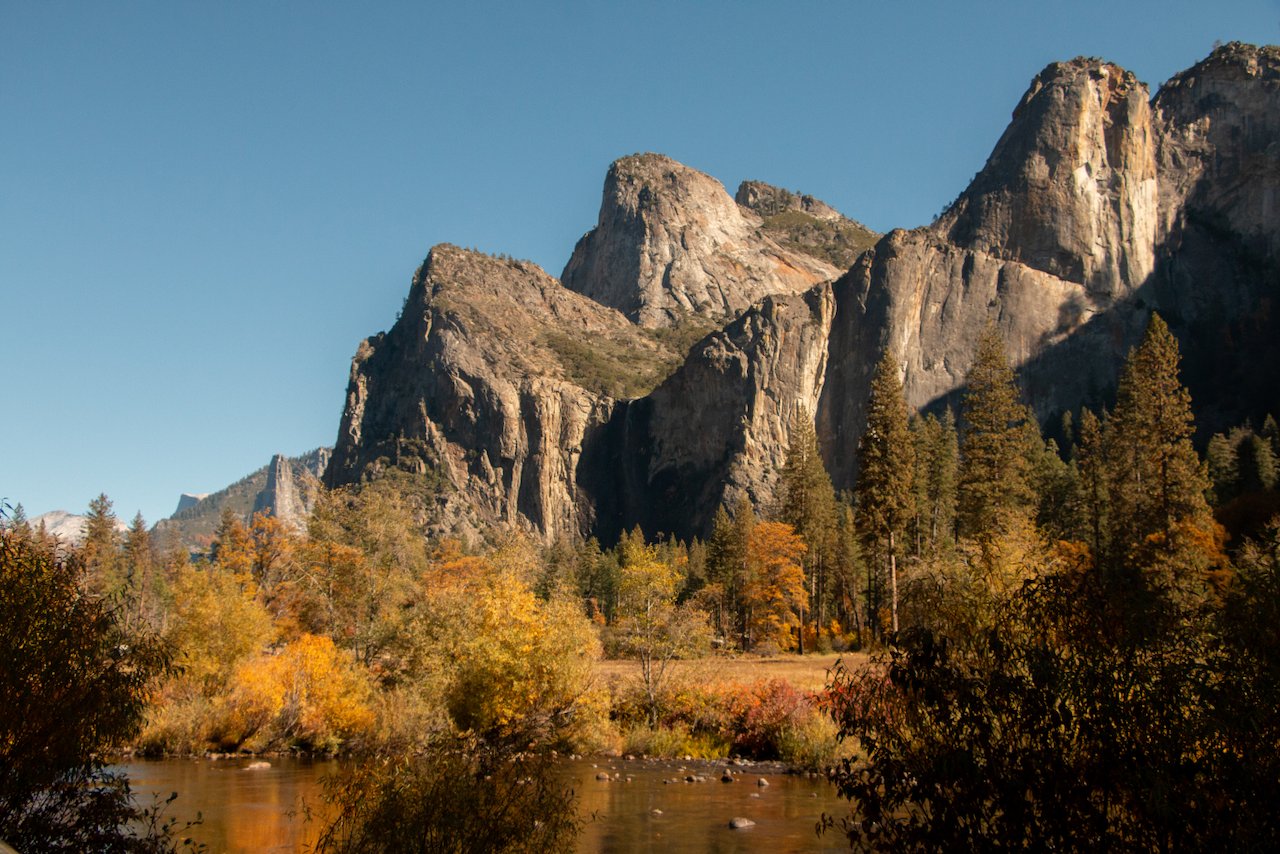 A mountain range cast in golden light