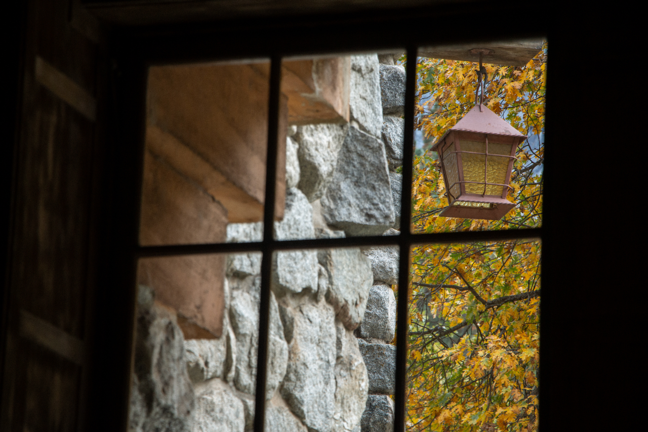 A window reveals a lantern outside